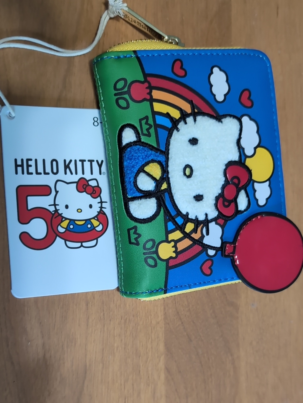 Hello Kitty Rainbow Zip Wallet — Blue, Green & Red Accent